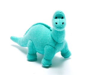 Small knitted diplodocus dinosaur baby toy with long neck and smiley face knitted in vivid ice blue yarn